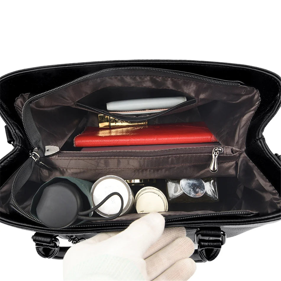 Masterpiece Grained Leather Messenger Bag