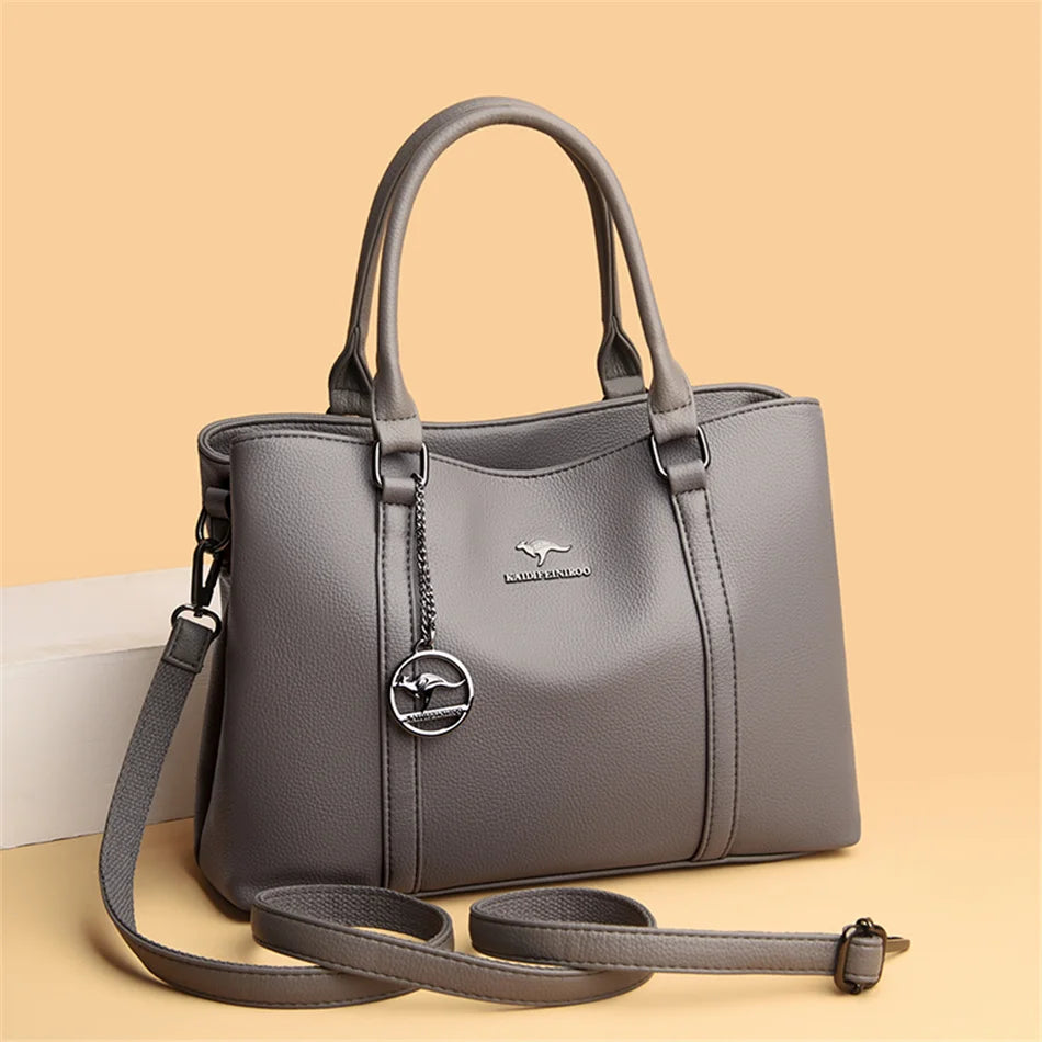 Masterpiece Grained Leather Messenger Bag