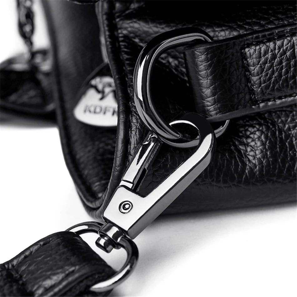 Masterpiece Grained Leather Messenger Bag