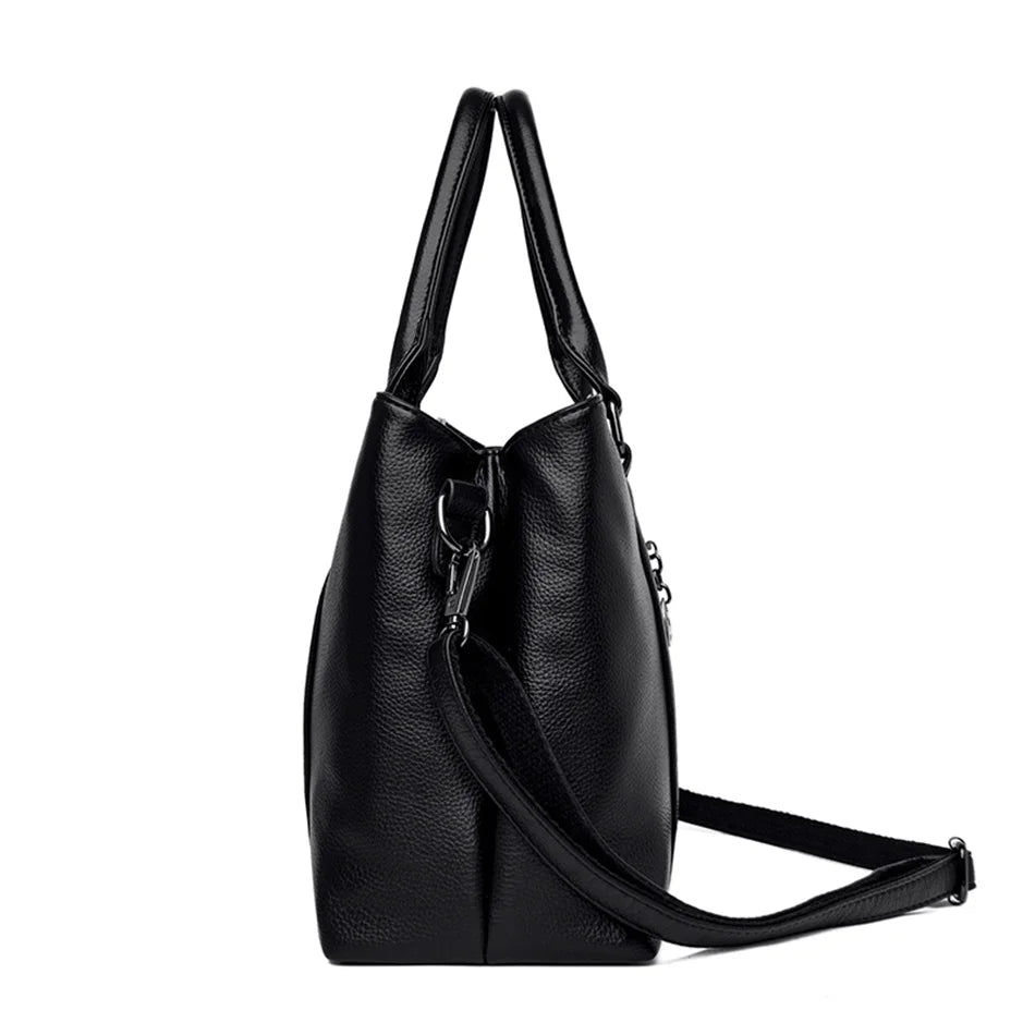 Masterpiece Grained Leather Messenger Bag