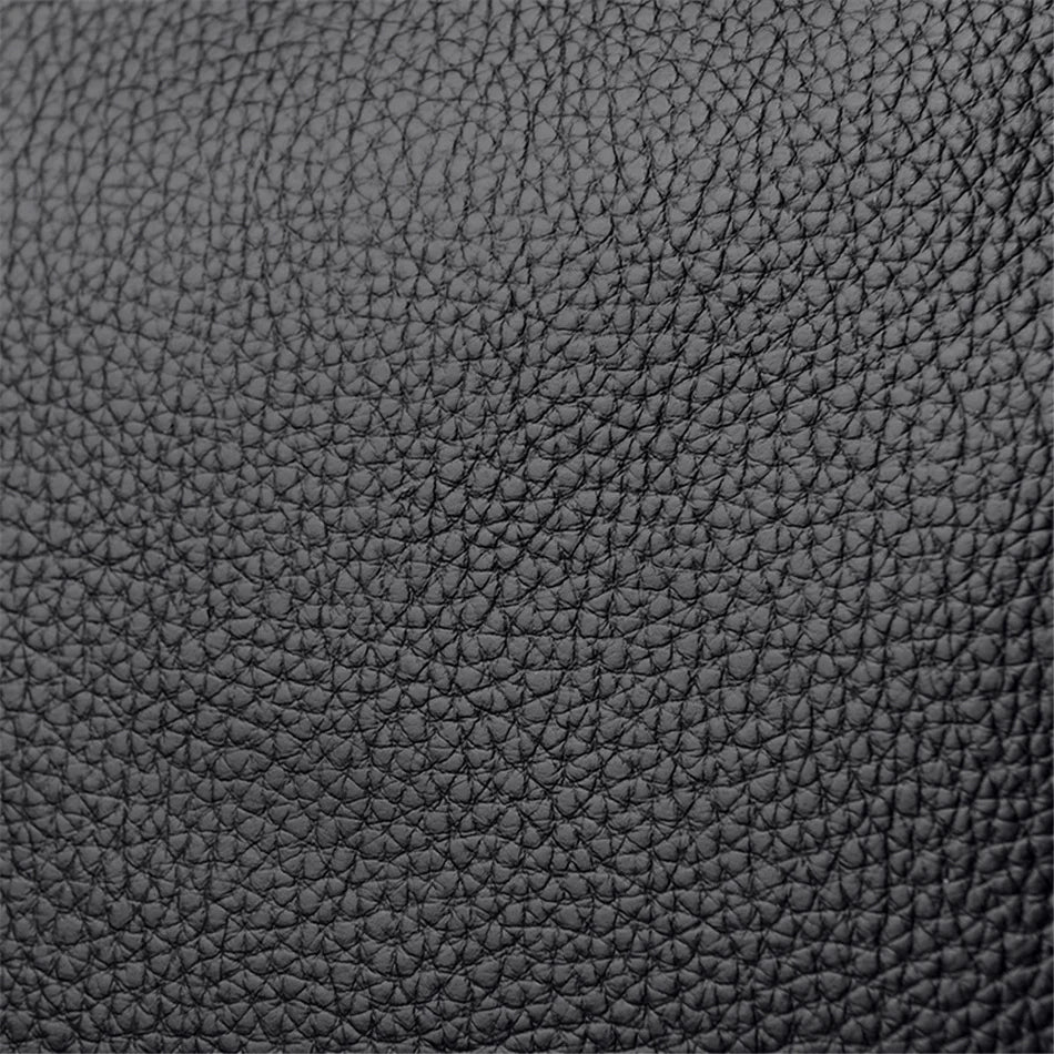 Masterpiece Grained Leather Messenger Bag