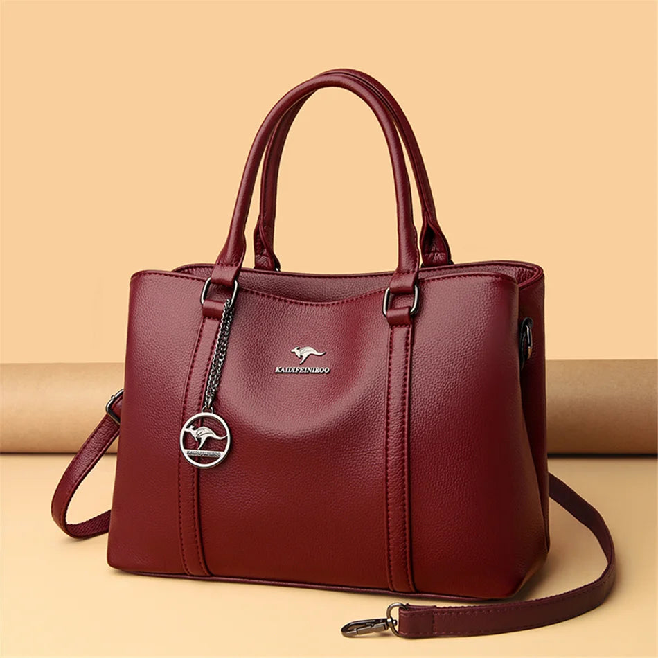 Masterpiece Grained Leather Messenger Bag