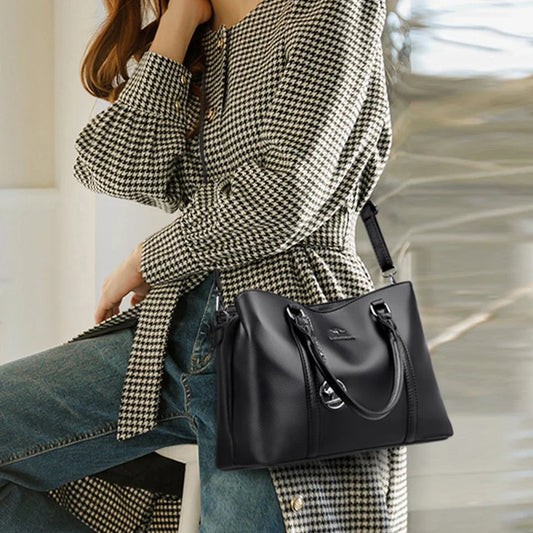 Masterpiece Grained Leather Messenger Bag